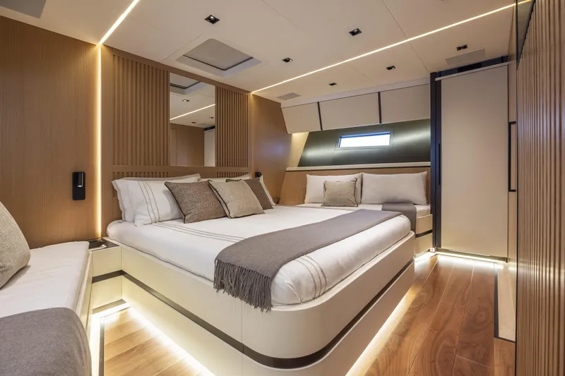 Yacht Photos Pics Luxurious interior of 2024 Otam 90 GTS yacht with modern bedroom design.