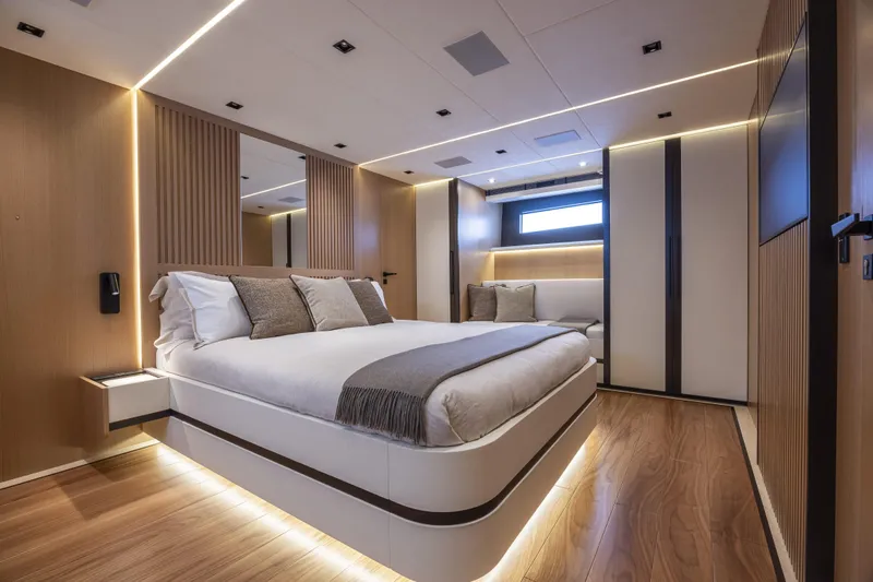  Yacht Photos Pics Luxurious interior of 2024 Otam 90 GTS yacht with modern bedroom design.