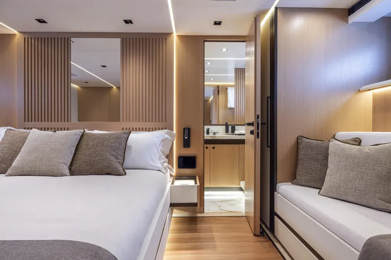  Yacht Photos Pics Luxurious interior of 2024 Otam 90 GTS yacht with modern bedroom and bathroom design.