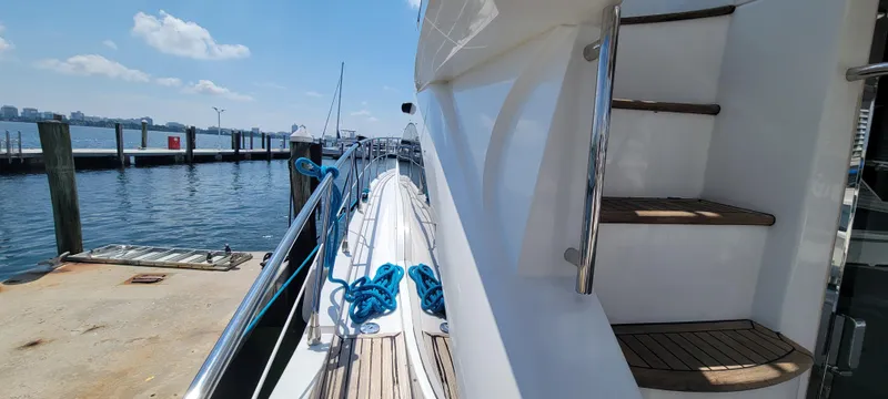  Yacht Photos Pics 2013 Azimut 45 Flybridge yacht docked at marina with blue ropes.