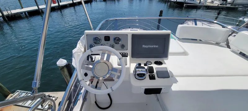  Yacht Photos Pics Flybridge helm of 2013 Azimut 45 yacht with Raymarine navigation system.