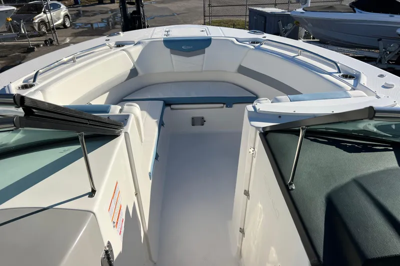  Yacht Photos Pics 2026 Robalo R317 Dual Console boat interior with spacious seating and sleek design.