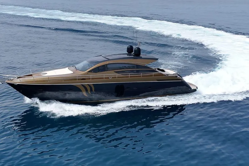 Candyman Yacht Photos Pics Luxury 2009 Pershing 64 yacht cruising on open water, showcasing sleek design and elegance.