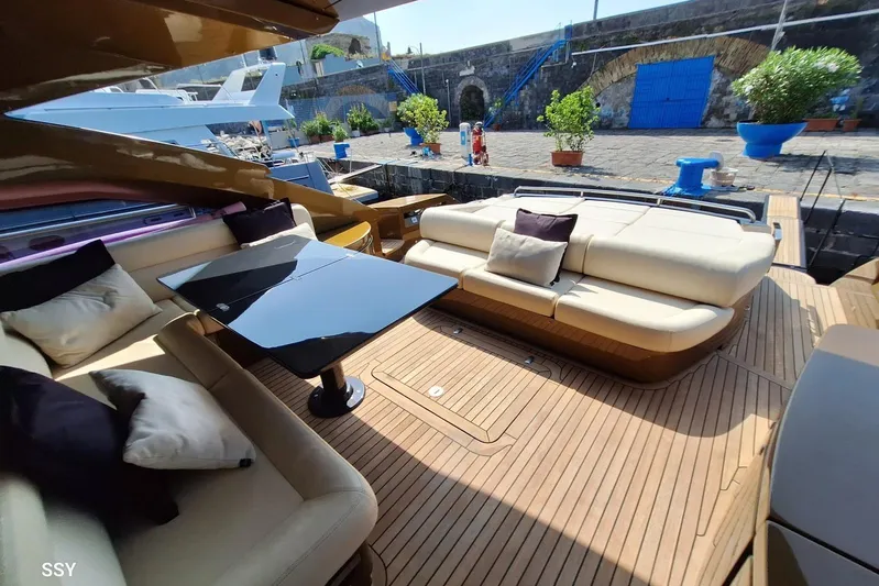 Candyman Yacht Photos Pics Luxurious 2009 Pershing 64 yacht with elegant seating and sleek design.