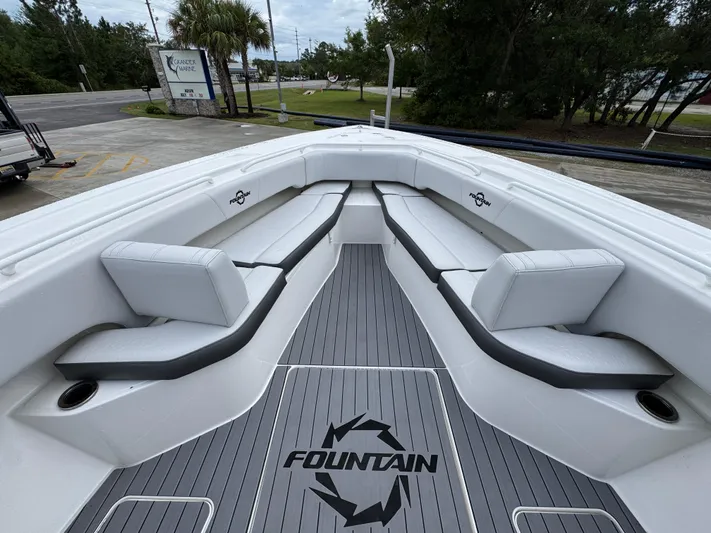  Yacht Photos Pics 2022 Fountain 38 CC boat interior with sleek seating and modern design.
