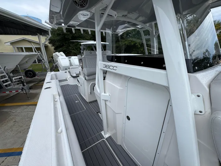  Yacht Photos Pics 2022 Fountain 38 CC boat interior with sleek seating and modern design.