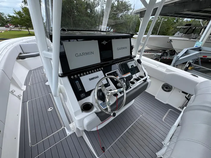  Yacht Photos Pics 2022 Fountain 38 CC boat cockpit with Garmin and Simrad displays.