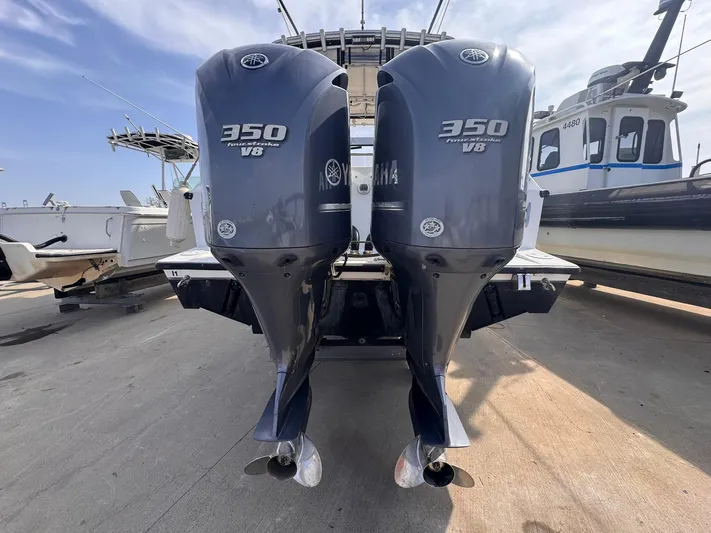  Yacht Photos Pics Twin Yamaha 350 V8 outboard engines on a 1998 Contender 35 Express Side Console boat.
