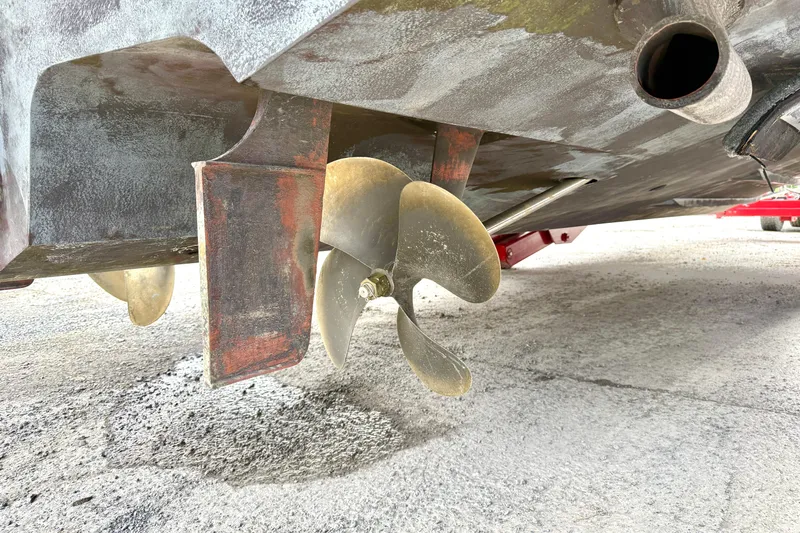  Yacht Photos Pics 2004 Searay 360 Sundancer boat propeller and rudder detail on dry dock.