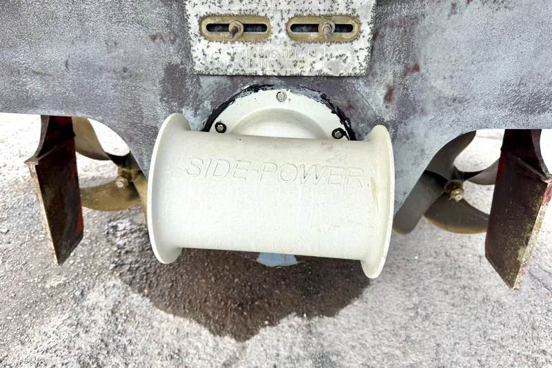  Yacht Photos Pics 2004 Searay 360 Sundancer boat thruster with "Side-Power" branding, showing propellers.