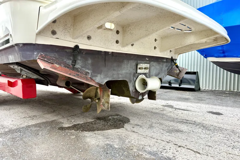  Yacht Photos Pics 2004 Searay 360 Sundancer boat underside showing propeller and rudder details.