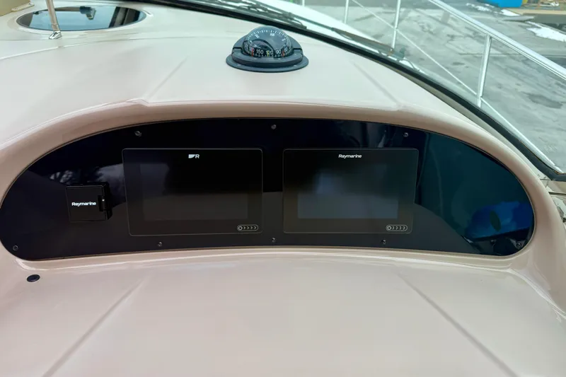  Yacht Photos Pics Dashboard of 2004 Searay 360 Sundancer with Raymarine navigation displays.