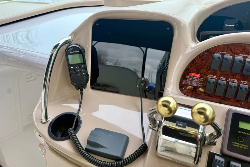  Yacht Photos Pics Control panel of a 2004 Searay 360 Sundancer boat with Raymarine equipment.
