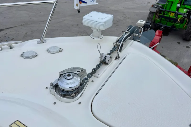  Yacht Photos Pics 2004 Searay 360 Sundancer boat anchor system with chain and winch on deck.