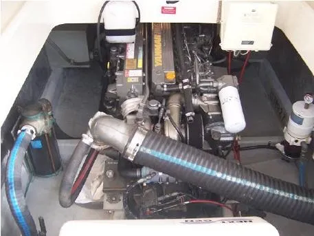 Arcadia Yacht Photos Pics Engine compartment of 2005 Mainship 34 Pilot Rum Runner II with visible components.