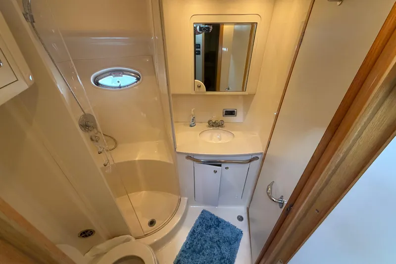  Yacht Photos Pics Bathroom interior of 2002 Sea Ray 480 Motor Yacht with shower and vanity.