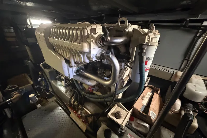  Yacht Photos Pics Engine room of 2002 Sea Ray 480 Motor Yacht, showcasing detailed machinery components.