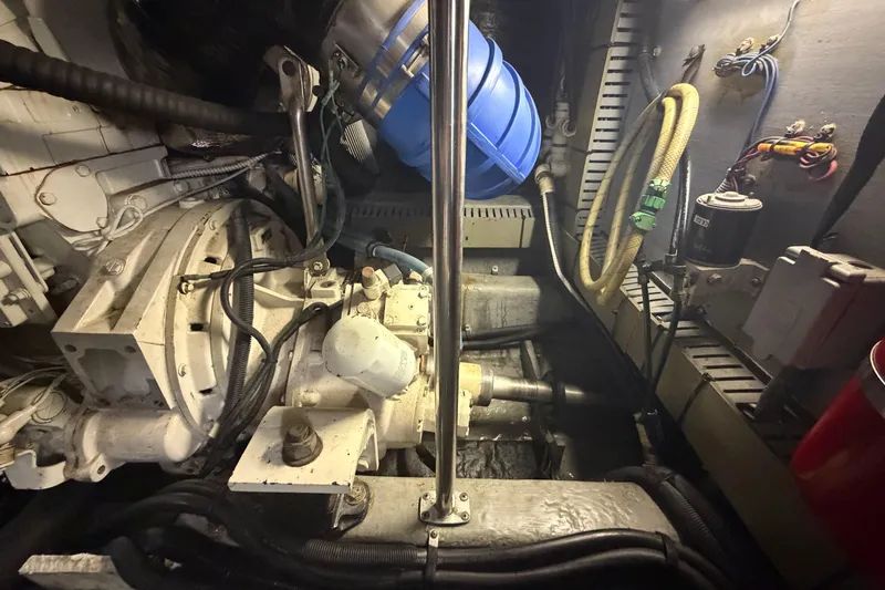  Yacht Photos Pics Engine room of a 2002 Sea Ray 480 Motor Yacht, showcasing mechanical components and wiring.