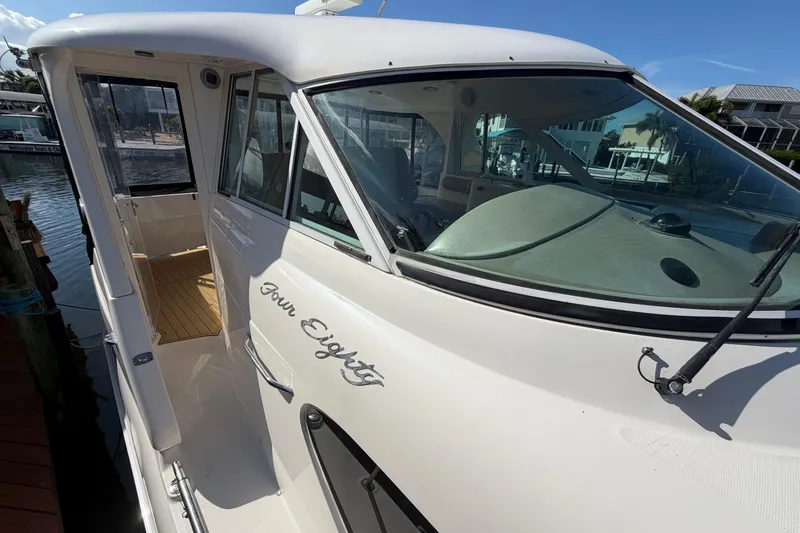  Yacht Photos Pics 2002 Sea Ray 480 Motor Yacht docked, showcasing sleek design and spacious interior.