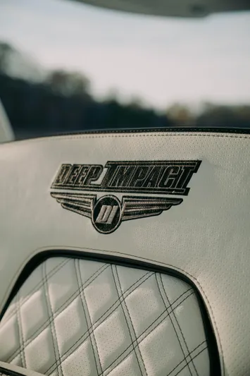  Yacht Photos Pics Deep Impact 399 Sport 2021 boat seat with logo and quilted design.