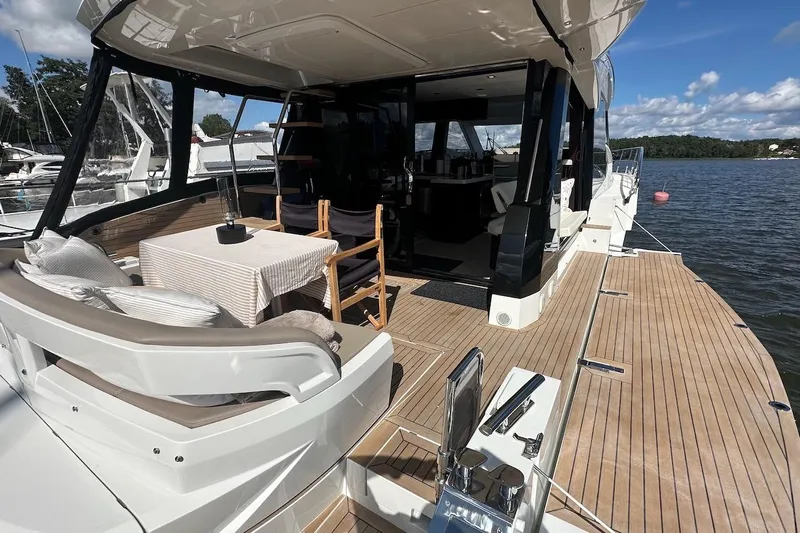  Yacht Photos Pics 2024 Galeon 500 Fly yacht with spacious deck and elegant dining area.