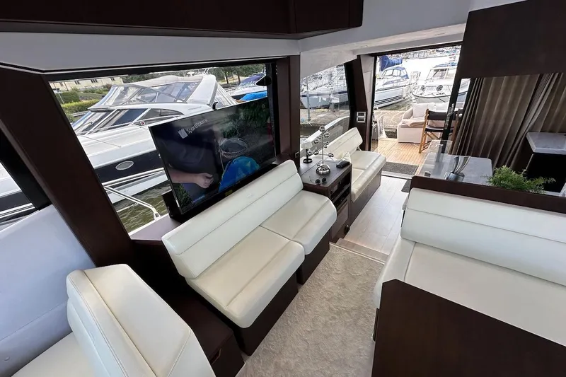  Yacht Photos Pics Luxurious interior of 2024 Galeon 500 Fly yacht with modern seating and entertainment system.