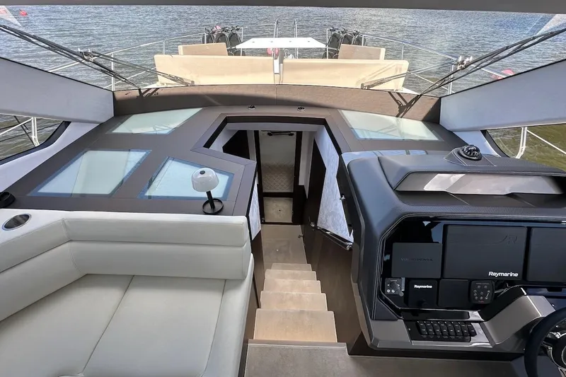 Yacht Photos Pics Interior view of 2024 Galeon 500 Fly yacht with modern helm and seating.