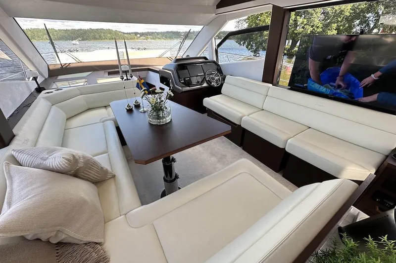  Yacht Photos Pics Luxurious interior of 2024 Galeon 500 Fly yacht with elegant seating and scenic views.