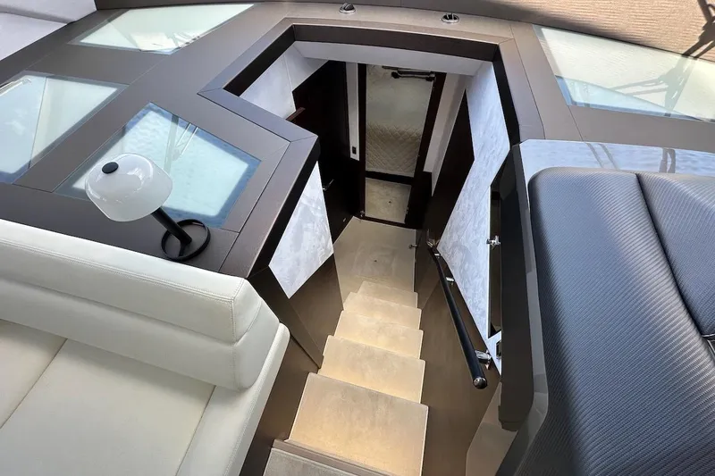  Yacht Photos Pics Interior stairs of 2024 Galeon 500 Fly yacht, featuring modern design and elegant finishes.