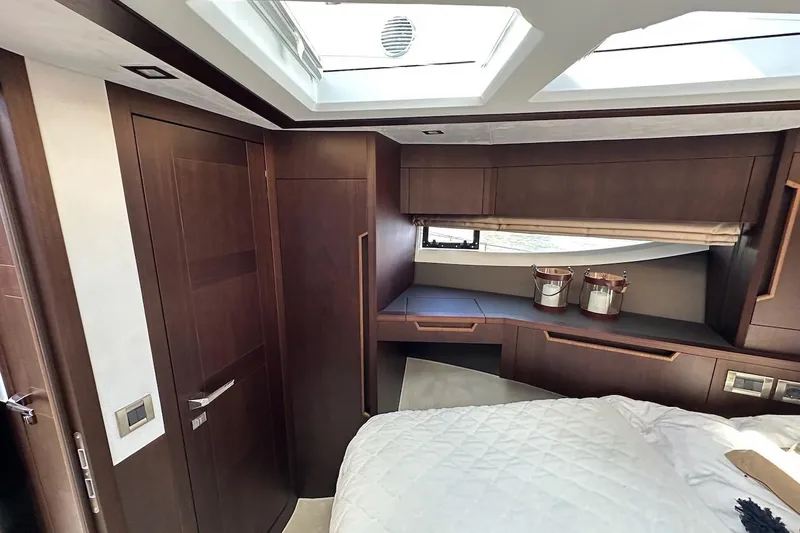  Yacht Photos Pics Luxurious interior of 2024 Galeon 500 Fly yacht with elegant wood finishes.