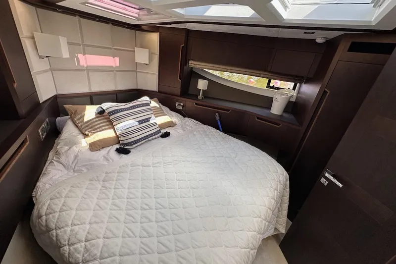  Yacht Photos Pics Luxurious bedroom interior of 2024 Galeon 500 Fly yacht with modern design.