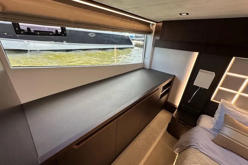  Yacht Photos Pics Luxurious interior of 2024 Galeon 500 Fly yacht with modern design and large window view.