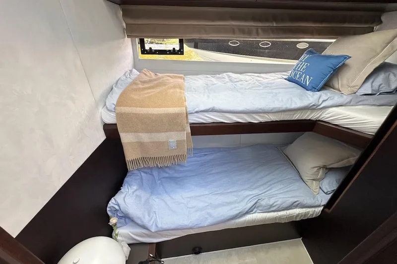  Yacht Photos Pics 2024 Galeon 500 Fly cabin with cozy bunk beds and nautical decor.