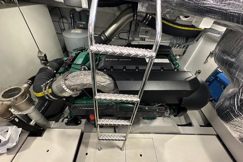  Yacht Photos Pics Engine room of 2024 Galeon 500 Fly yacht with visible machinery and ladder.