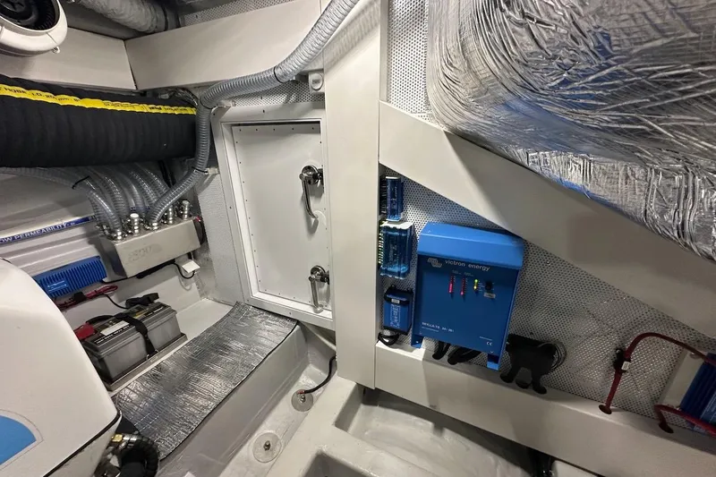  Yacht Photos Pics Engine room of 2024 Galeon 500 Fly yacht with electrical systems and components.