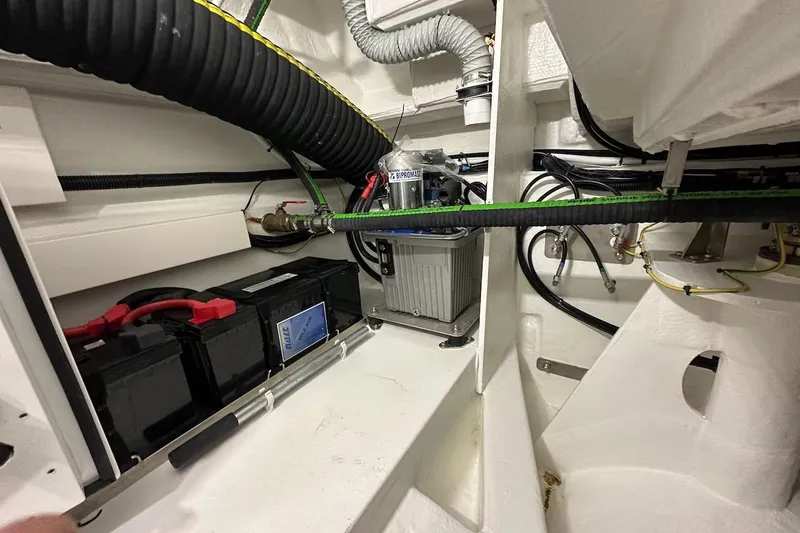  Yacht Photos Pics Engine room of 2024 Galeon 500 Fly yacht, showcasing batteries and wiring.