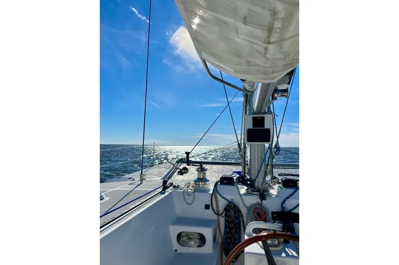 Watermark Yacht Photos Pics Sailing on a 2003 Chris White Atlantic 42 catamaran under clear blue skies.