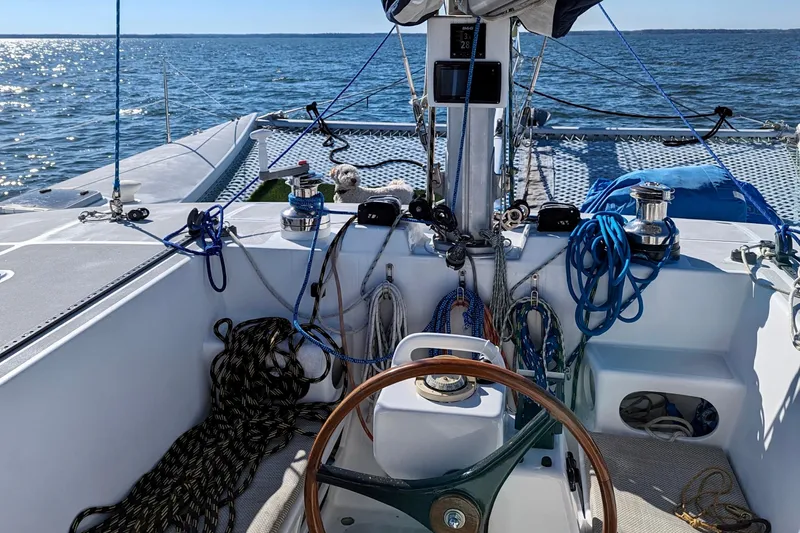 Watermark Yacht Photos Pics Cockpit of 2003 Chris White Atlantic 42 catamaran with ropes and steering wheel.
