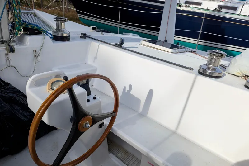 Watermark Yacht Photos Pics Steering wheel and deck of 2003 Chris White Atlantic 42 sailboat.