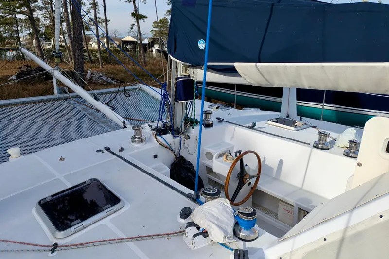 Watermark Yacht Photos Pics 2003 Chris White Atlantic 42 sailboat cockpit with steering wheel and rigging.