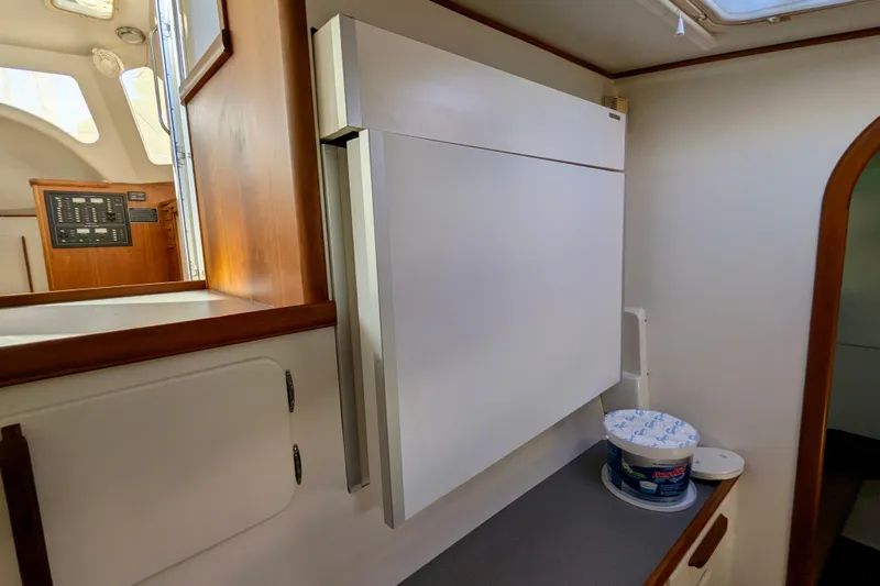 Watermark Yacht Photos Pics Interior of 2003 Chris White Atlantic 42 yacht, featuring a compact kitchen area.