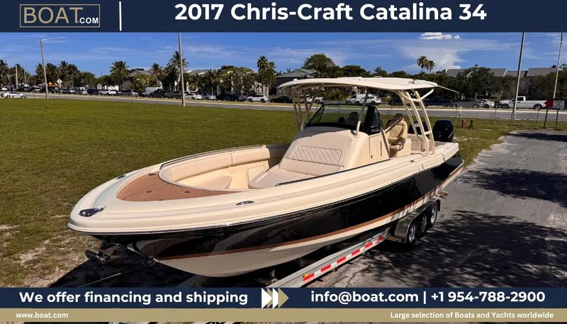 Yacht Photos Pics 2017 Chris-Craft Catalina 34 boat on trailer, outdoor setting, contact info for financing and shipping.