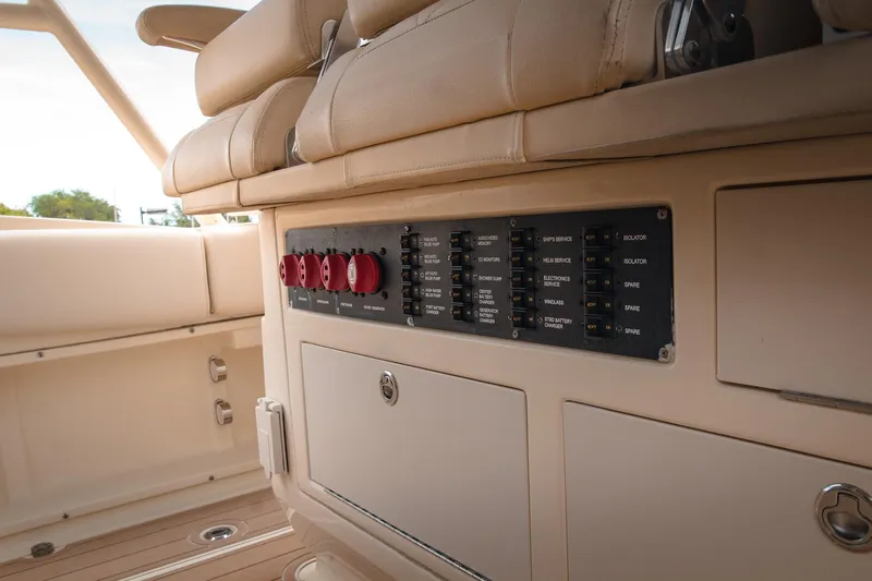  Yacht Photos Pics 2017 Chris-Craft Catalina 34 boat interior with control panel and beige seating.