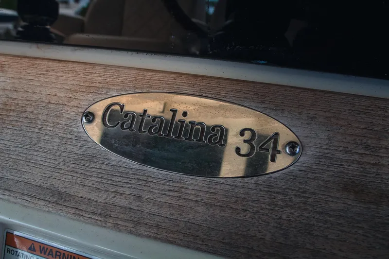  Yacht Photos Pics 2017 Chris-Craft Catalina 34 nameplate on wooden surface.