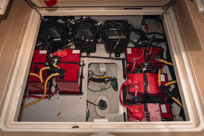  Yacht Photos Pics Engine compartment of 2017 Chris-Craft Catalina 34, showcasing batteries and wiring.