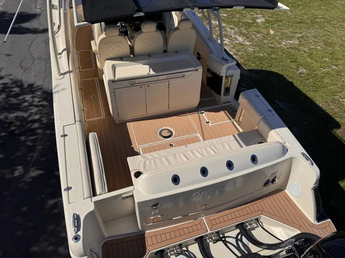 Yacht Photos Pics 2017 Chris-Craft Catalina 34 boat interior with seating and storage, viewed from above.
