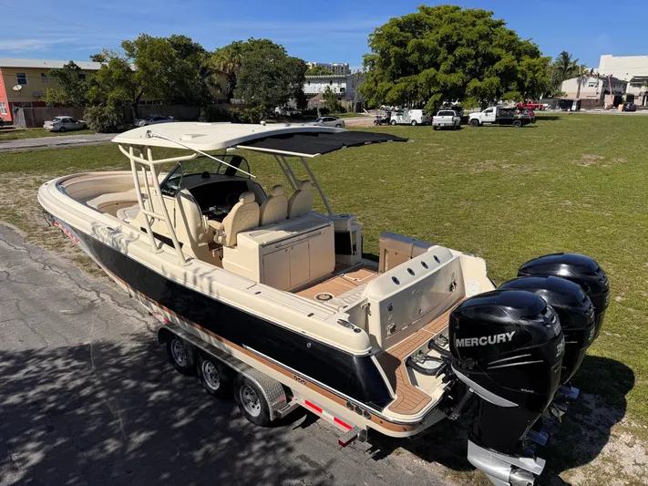  Yacht Photos Pics 2017 Chris-Craft Catalina 34 boat with triple Mercury engines on a trailer.