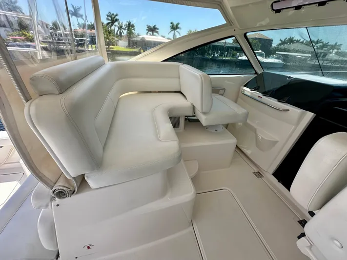  Yacht Photos Pics Luxurious interior seating of 2018 Tiara Yachts 4300 Open, featuring elegant white upholstery.