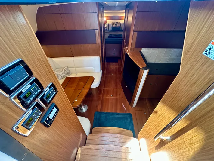  Yacht Photos Pics Interior of 2018 Tiara Yachts 4300 Open, featuring wood finishes and modern amenities.