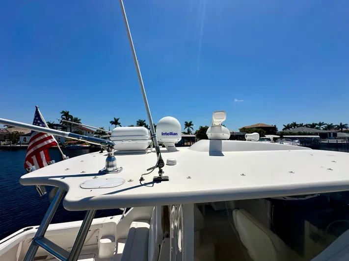  Yacht Photos Pics Tiara Yachts 4300 Open 2018 model, featuring a sleek deck with navigation equipment.